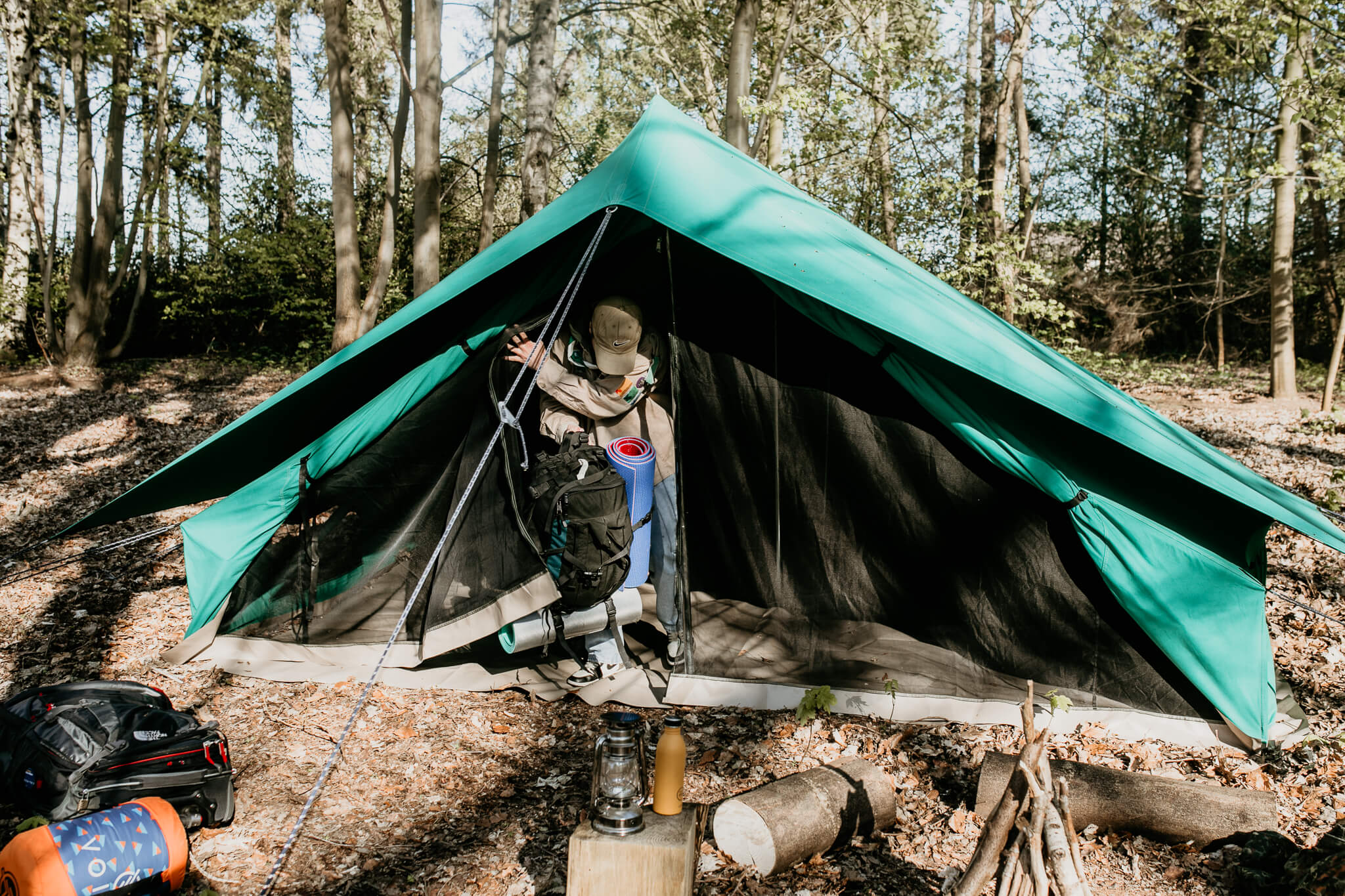 Why does a scout camp attracts so many young people in Belgium?